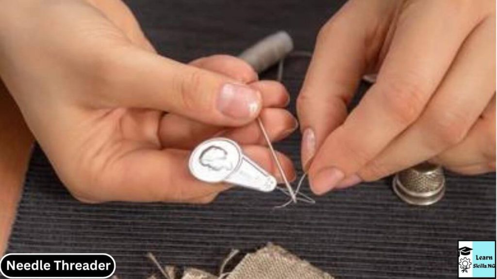 image of a needle threader being used